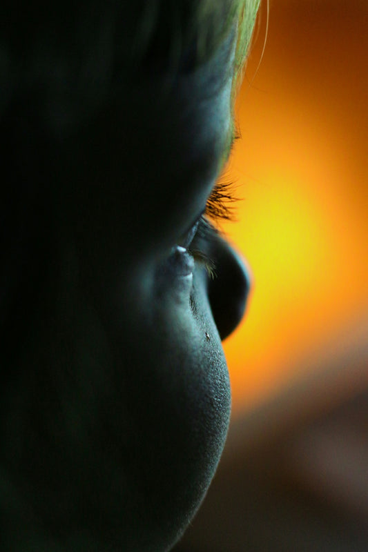 persons face in close up photography