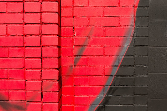 a brick wall with a shadow